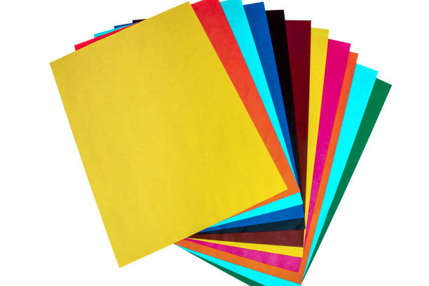 istock The different colored paper, cardboard on a white background. School accessories. Preparing a child for school. 921827784