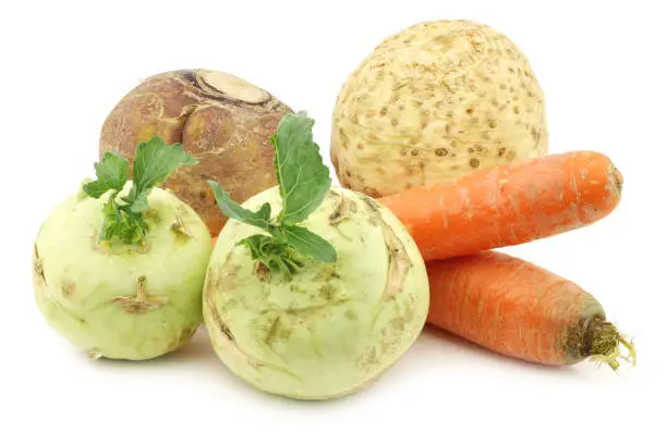 mixed rootvegetables on a white background