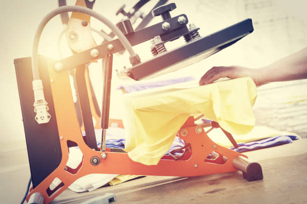Preparing t-shirt for printing in the silk screen printing machine