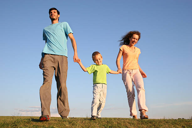 istock running family on meadow 92183642