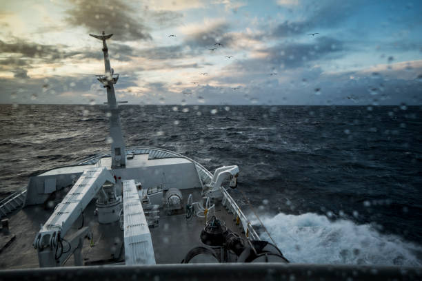 from the bridge of a fishing boat in a stormy sea - moody sky water sport passenger craft scenics imagens e fotografias de stock