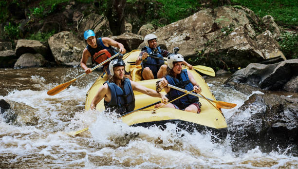 keep her steady guys - inflatable raft imagens e fotografias de stock