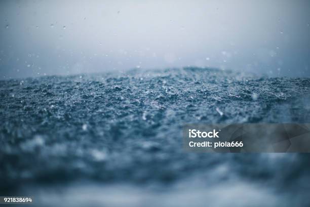 Rough Sea And Rain Drops Stock Photo - Download Image Now - Rain, Sea, Torrential Rain
