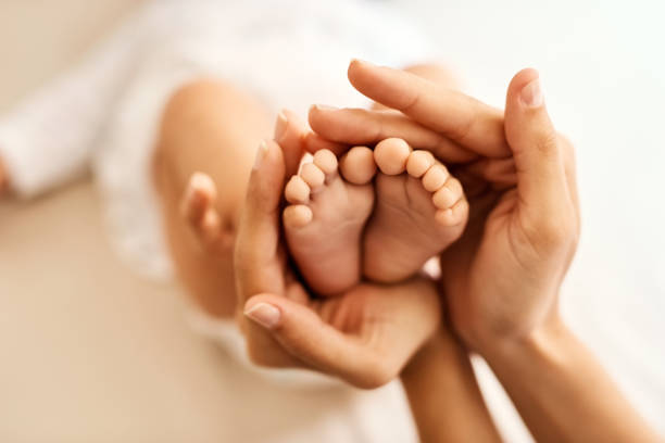 istock Nothing more sweet than tiny baby feet 921844478