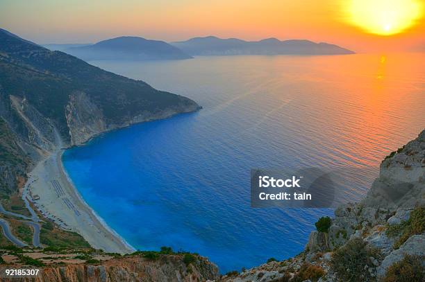 Sunset Over Myrtos Beach In Polaris Greece Stock Photo - Download Image Now - Kefalonia, Sunset, Aegean Sea