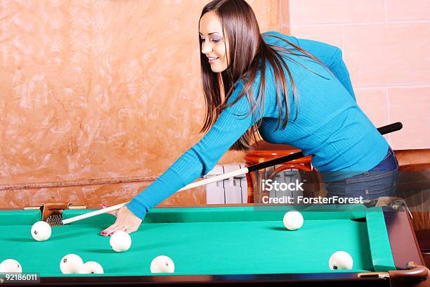 Woman In Blue Sweater Playing Billiards Stock Photo - Download Image Now - 20-29 Years, Adult, Adults Only