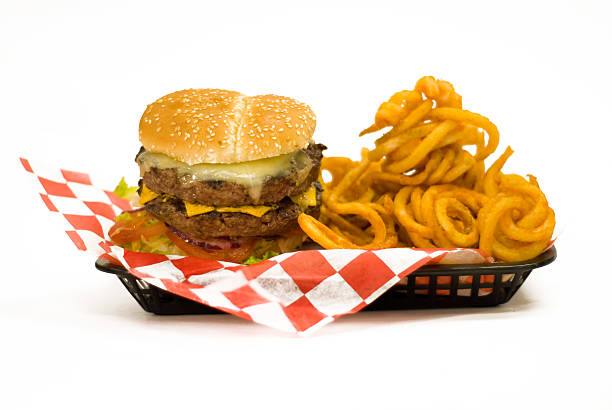 Juicy Burger with curly fries  curly fries stock pictures, royalty-free photos & images