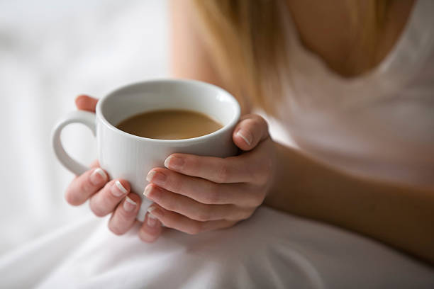 istock Woman holding a cup of coffee 92186376