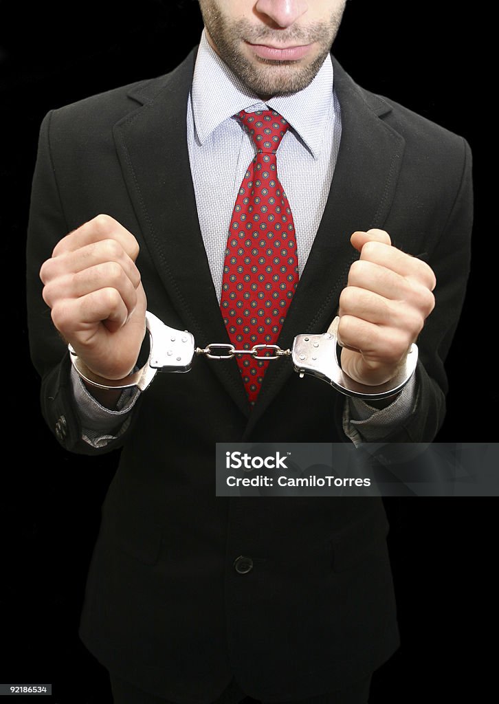 man in handcuffs  20-29 Years Stock Photo