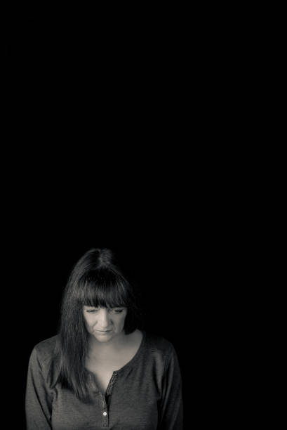 Double exposure portrait of beautiful young woman looking in opposite directions