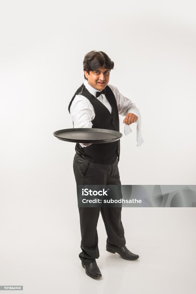 Asian Indian waiter or Bartender isolated over white background, selective focus Bartender Stock Photo