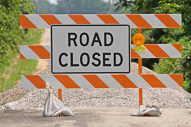 Road Closed Sign  road closed sign horizontal road nobody stock pictures, royalty-free photos & images