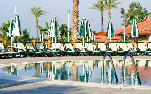 istock Sun loungers near pool 92186947