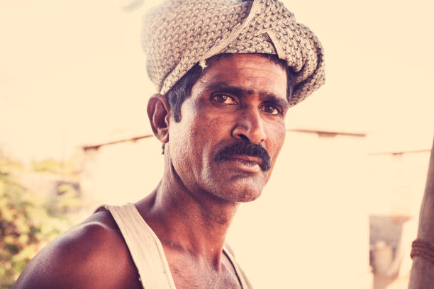 istock Indian man worker at local village job site. 921870308