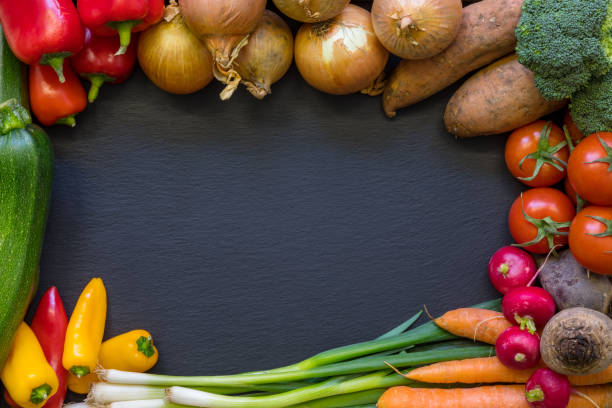 istock Healthy Vegetables on Slate Background 921870538