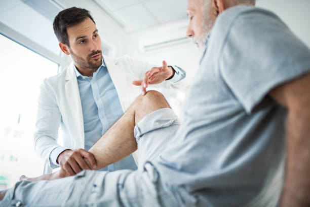 istock Senior man having medical exam. 921871082