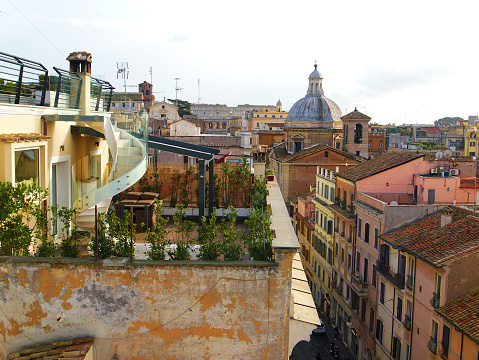 Scenic view from the roof top to the ancient buildings in Rome, Italy. Cityscape and skyline
