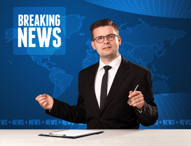 istock Television presenter in front telling breaking news with blue modern background 921872006