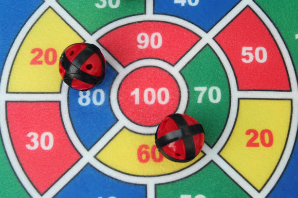 istock Kids dart game. Dart with sticky ball. 921874334