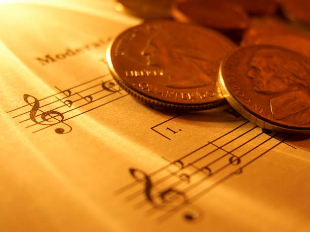 Pauta de Música e dinheiro - fotografia de stock