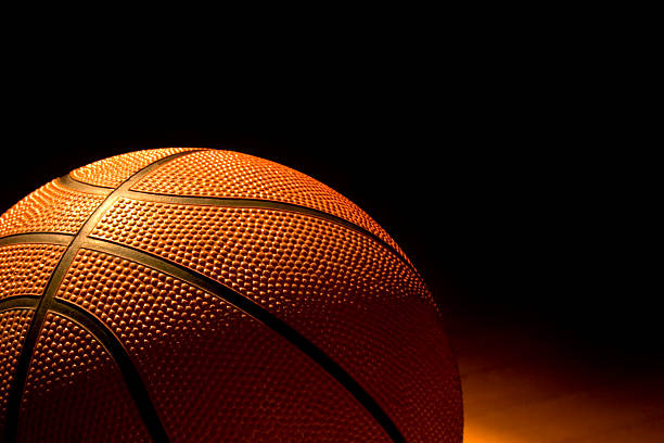 istock Close up of basketball in low light 92188284
