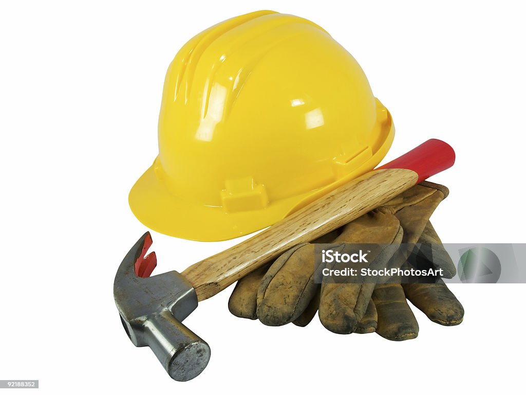 Capacete de segurança amarelo, de couro, luvas e um martelo - Foto de stock de Amarelo royalty-free