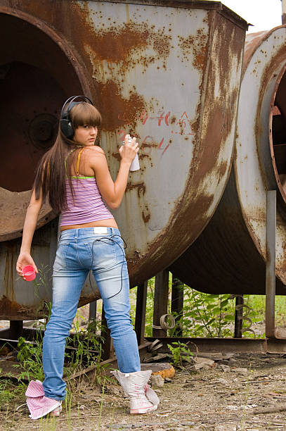 girl in headphones stock photo