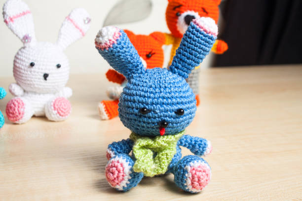 istock knitted toy cat, bear, rabbit, hare, handmade 921890262