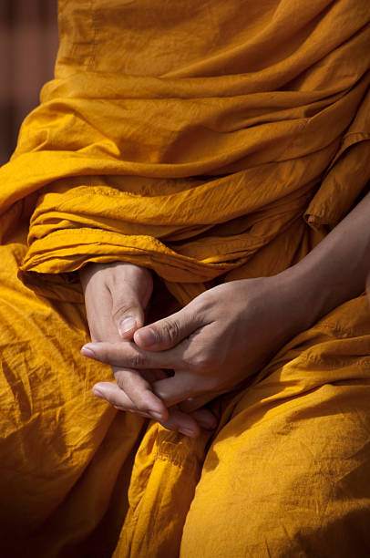 istock Hands of a Buddhist Monk During Meditation 92189191