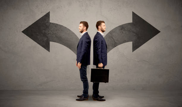 istock Businessman with two choices 921893256