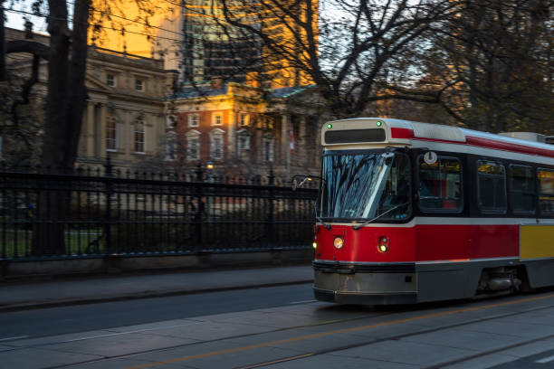 istock Old Fashioned Streetcar in Motion at Sunset 921895070