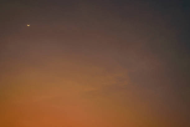 istock colorful sky after the twilight sunset with crescent moon 921899266