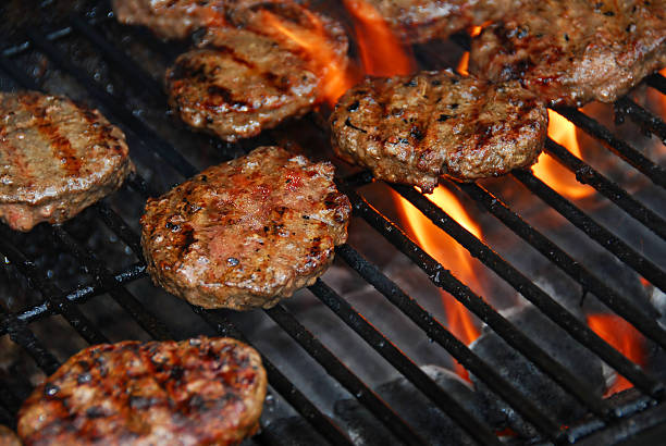 istock Hamburgers on barbeque 92190260