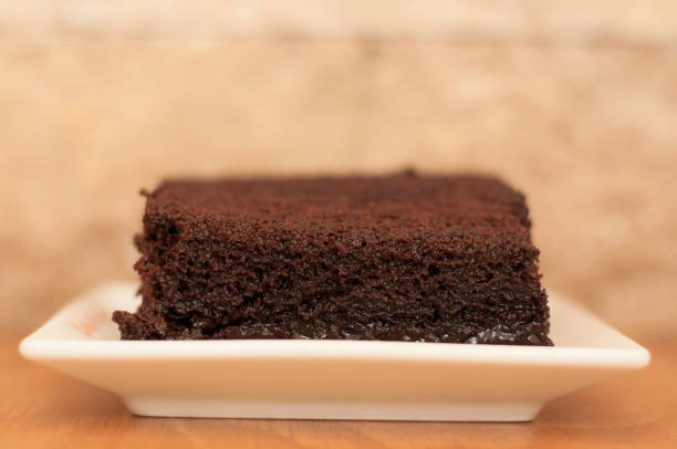 istock a piece of brownie cake on a white plate 921903188