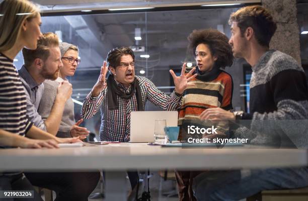 Furious Boss Shouting At His Team On A Meeting In The Office Stock Photo - Download Image Now