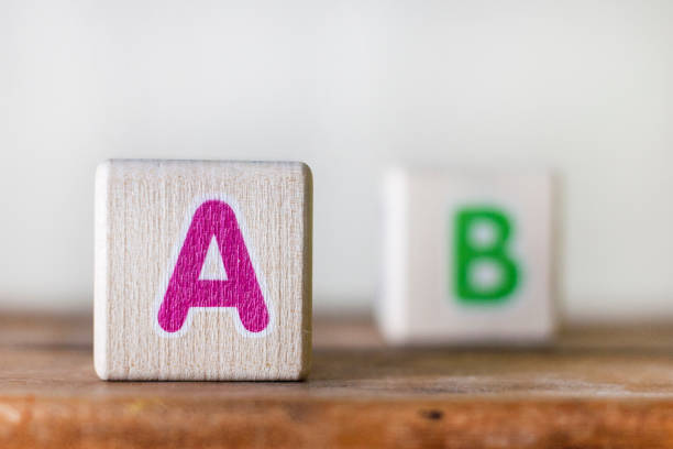 Wooden cubes with letters illustrating the sight of myopic people Wooden cubes with letters illustrating the sight of myopic people eye test equipment stock pictures, royalty-free photos & images