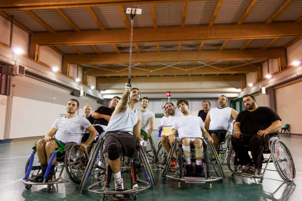 istock group of smiling disabled take a selfie 921916478
