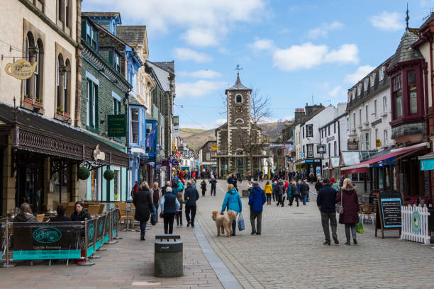 Keswich town centre in the Lake District, UK KESWICK, UK - APRIL 7TH 2017: The beautiful town centre in Keswick, located in the Lake District in Cumbria, UK, on 7th April 2017. keswick stock pictures, royalty-free photos & images
