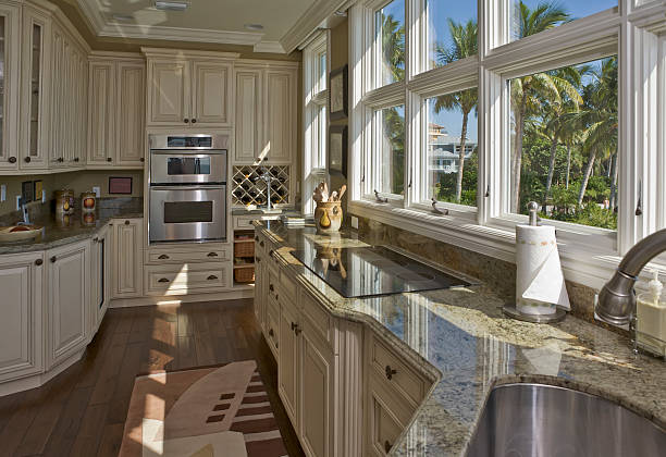 interior design of a modern and stylish bright kitchen in the house