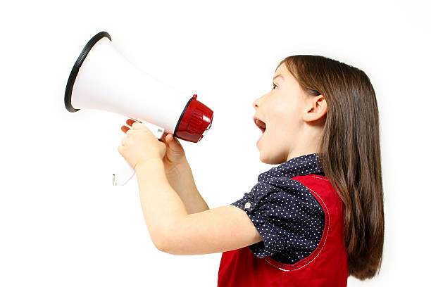 istock Young girl shouting over a megaphone 92191758