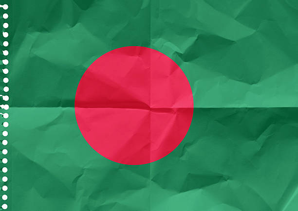 Bangladeshi flag on a sheet of paper torn out from a notebook.