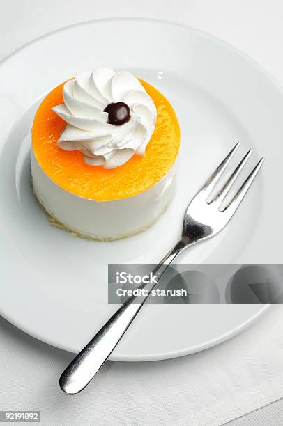 Cheesecake De Naranja Foto de stock y más banco de imágenes de Alcorza - Alcorza, Alimento, Blanco - Color