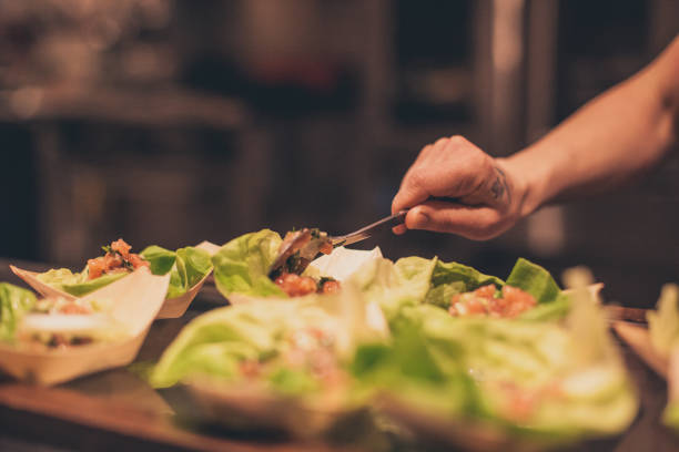 istock Chef At Work. Caterer Cooking In Commercial Kitchen 921919388