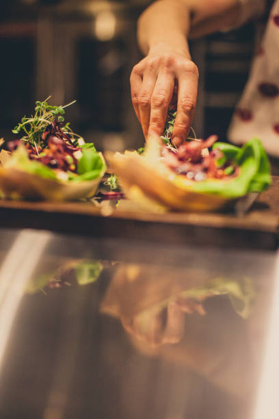istock Chef At Work. Caterer Cooking In Commercial Kitchen 921921528
