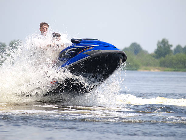 istock Jumping couple men on jet ski 92192669