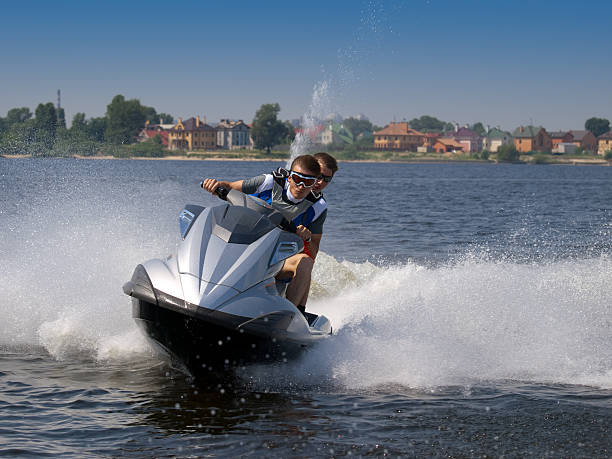 istock Couple men on jet ski 92192670