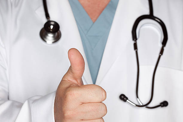 istock Male Doctor Thumbs Up with Lab Coat and Stethoscope 92192893