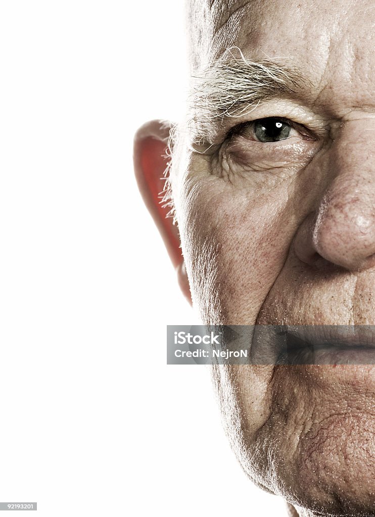 Elderly man's face over white background  Senior Adult Stock Photo