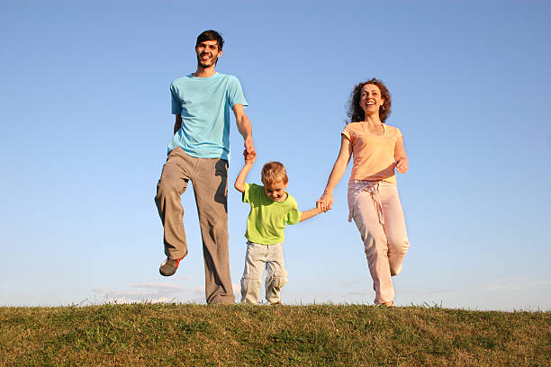 istock running family on meadow 2 92193401
