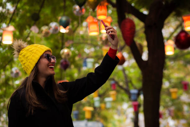 istock Smiling woman for selfie 921934236